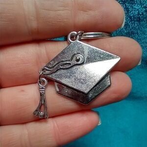 Silvertone graduation cap and tassel keychain